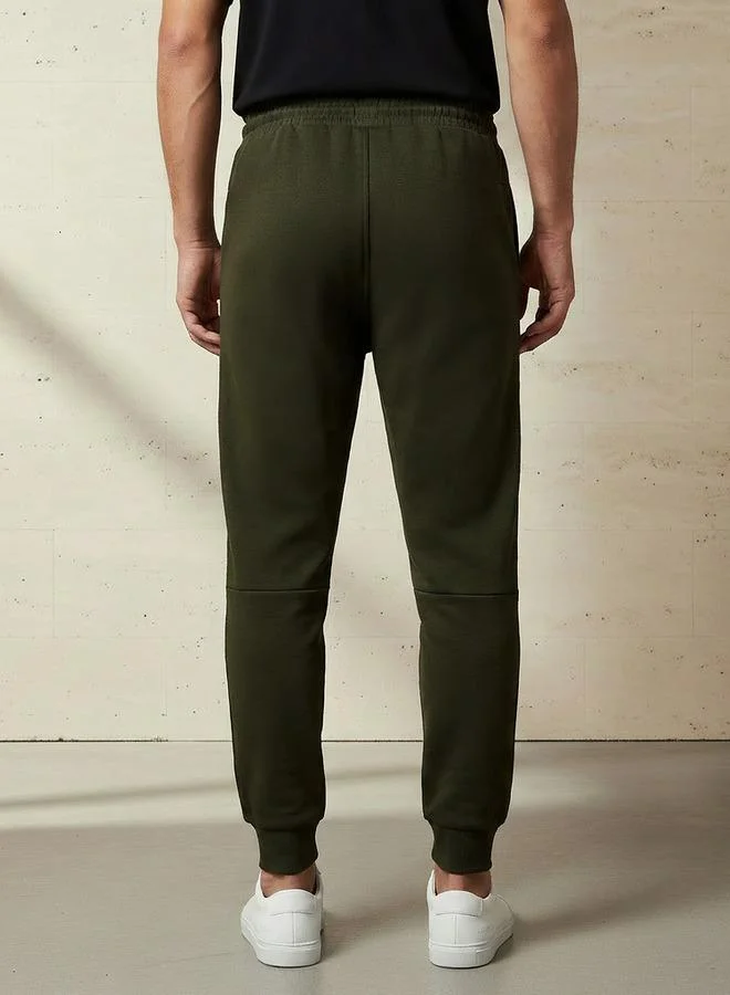 Kappa  Kappa Joggers with Heat Seal Zipper Pockets for Men | Best Price UAE